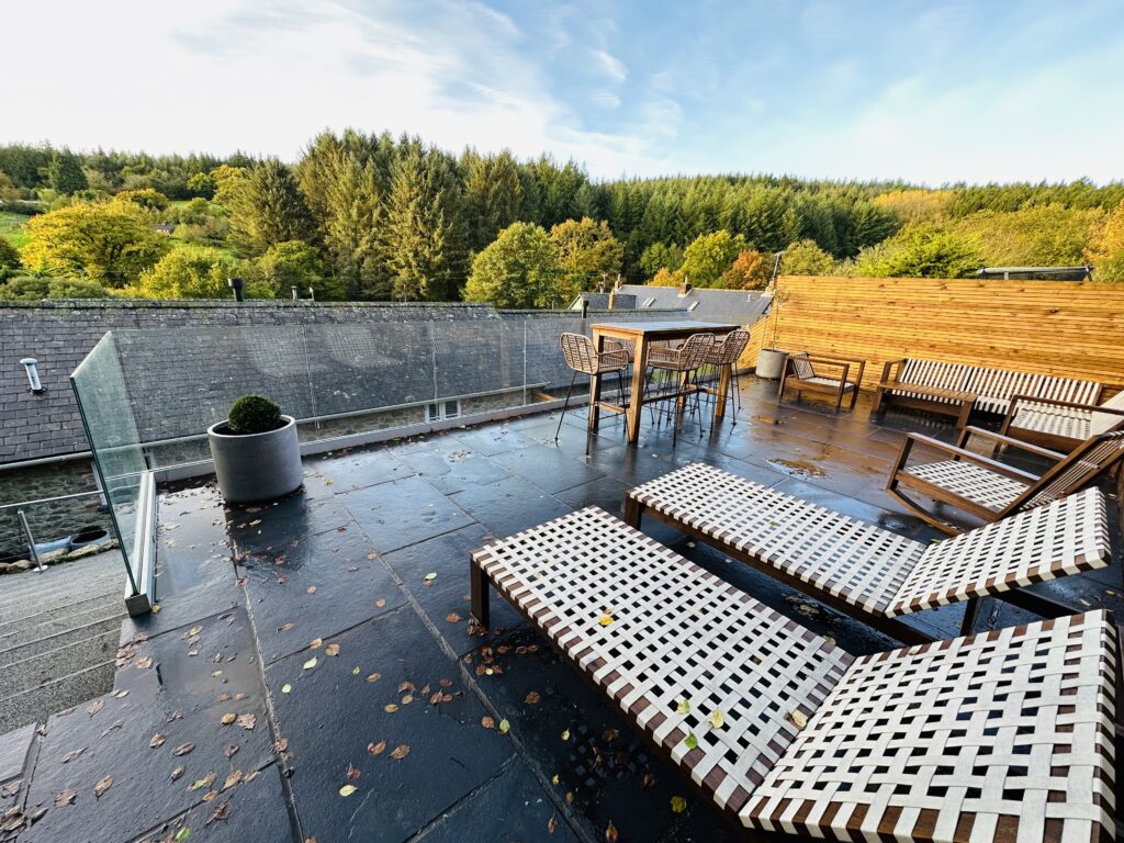 New resin bound patio with outdoor sun loungers