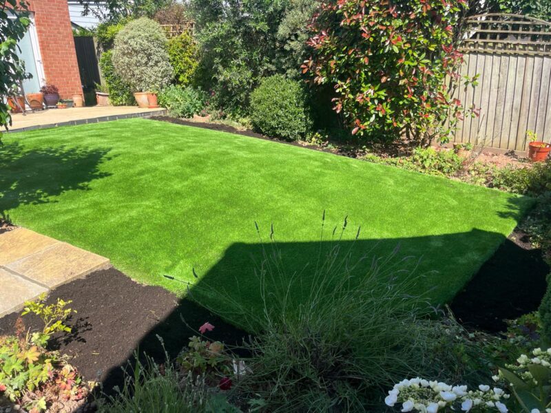 Artificial grass with landscaped garden borders