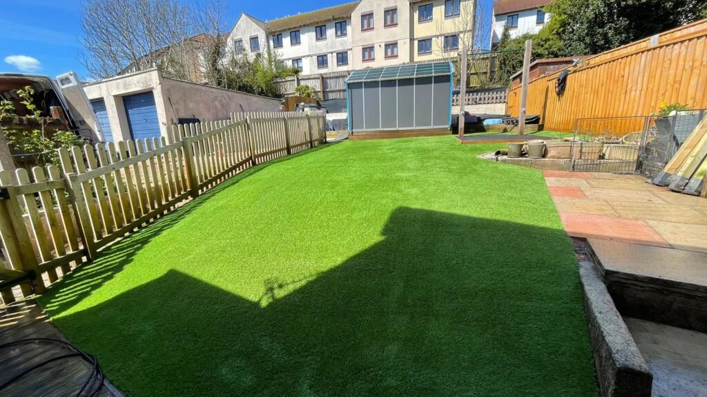Artificial grass installation in progress