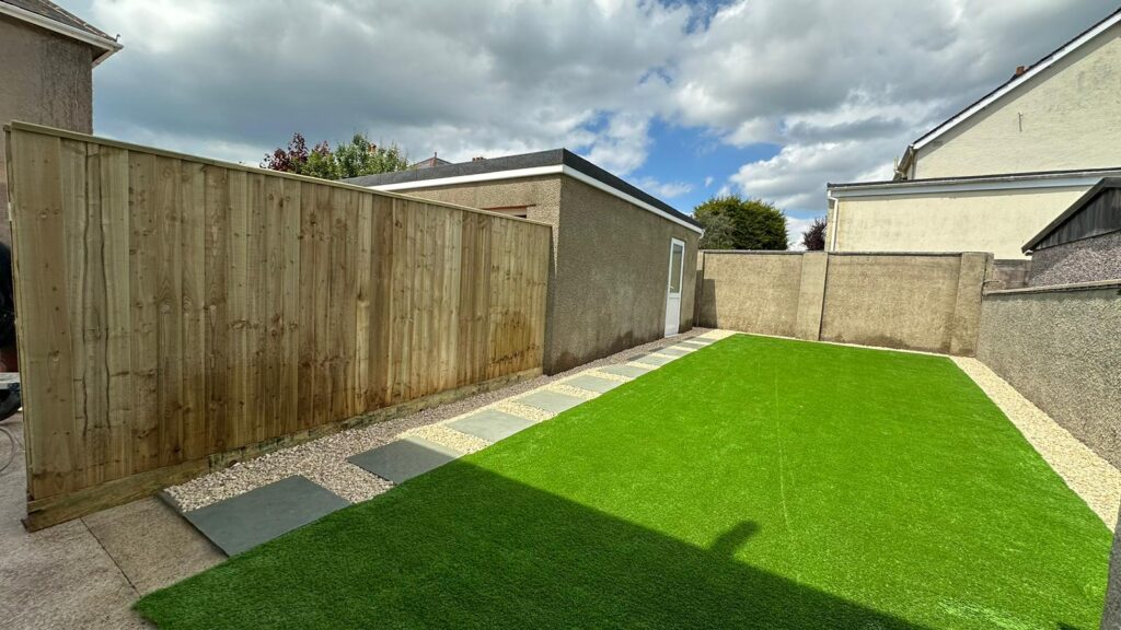 Artificial lawn installation in residential garden