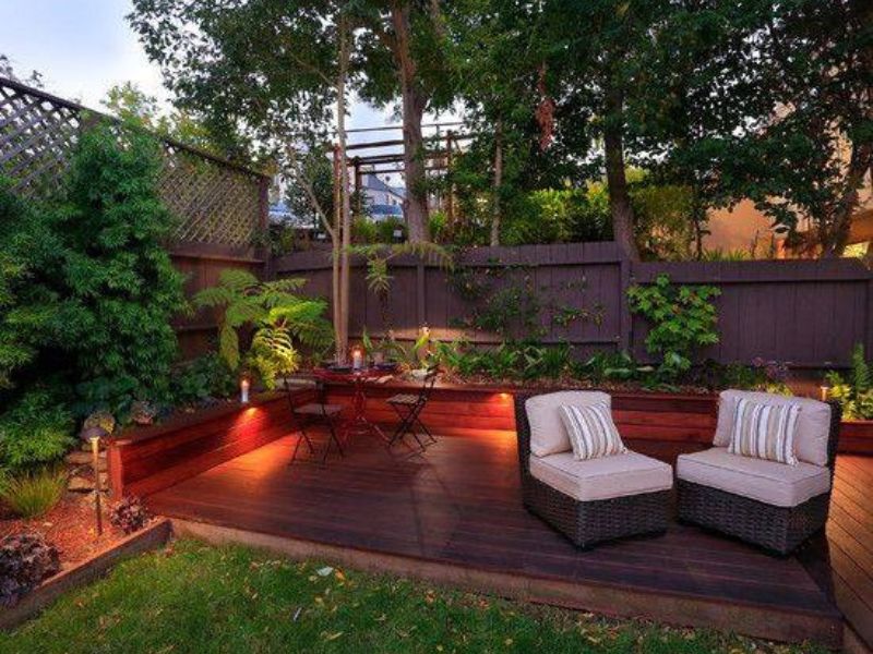 Garden decking with outdoor table and chairs