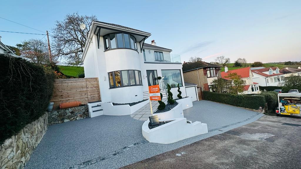 Resin bound driveway on a sloped hillside property