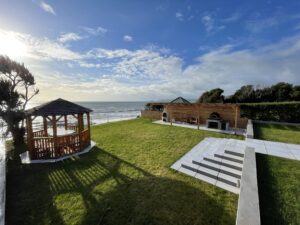 Coastal garden with gazebo and sea view