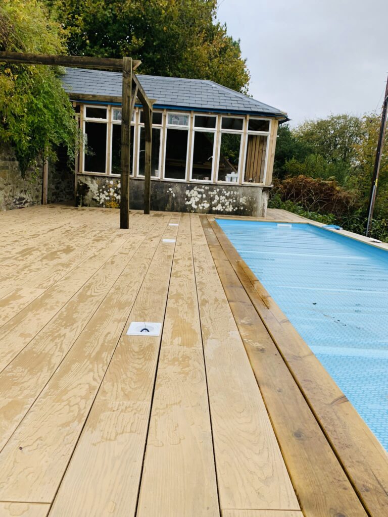 Close-up of composite decking boards with integrated LED lighting