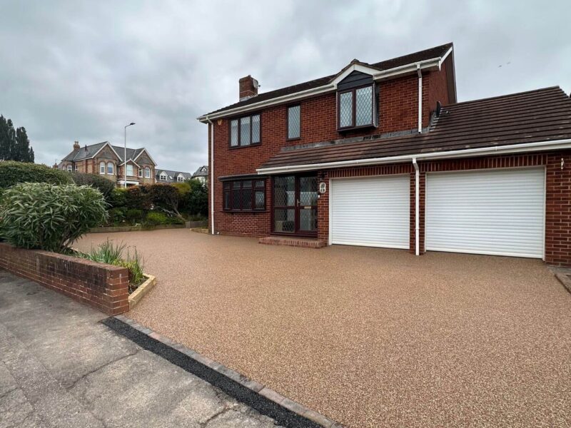Resin bound driveway surface leading to double garages