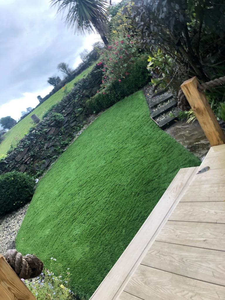 Completed artificial grass installation with neat borders, Bodmin