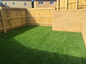 Timber fencing installation in residential garden
