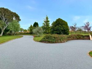 Curved resin bound driveway at residential property, Devon