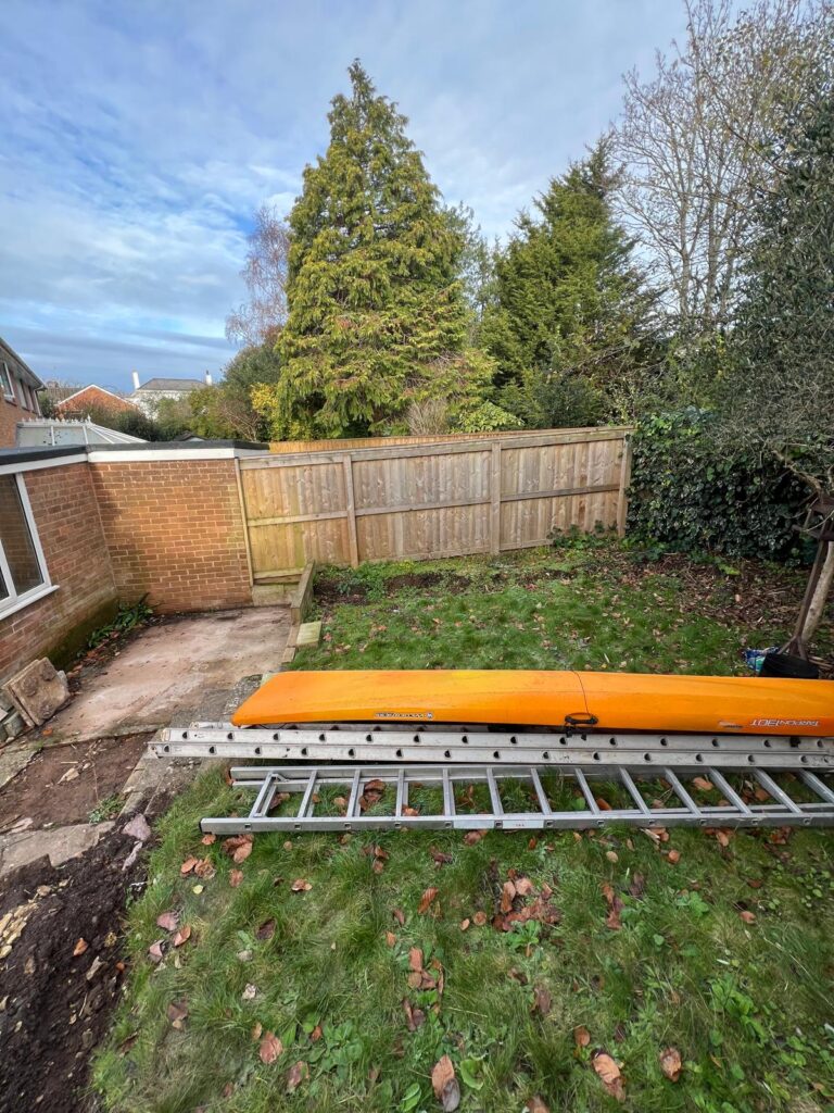 garden before overgrown lawn ladders exeter