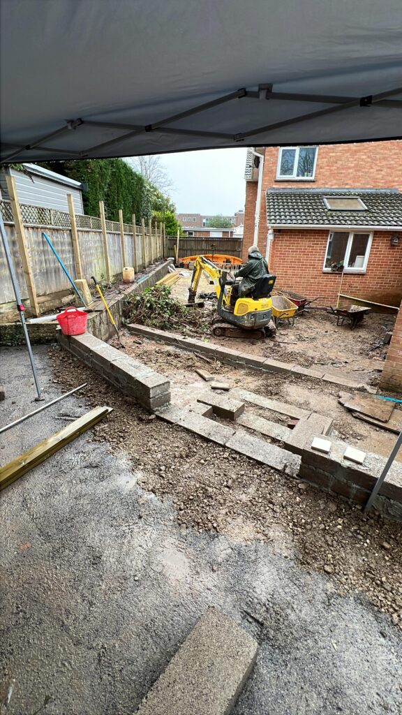 garden groundwork mini digger retaining wall exeter