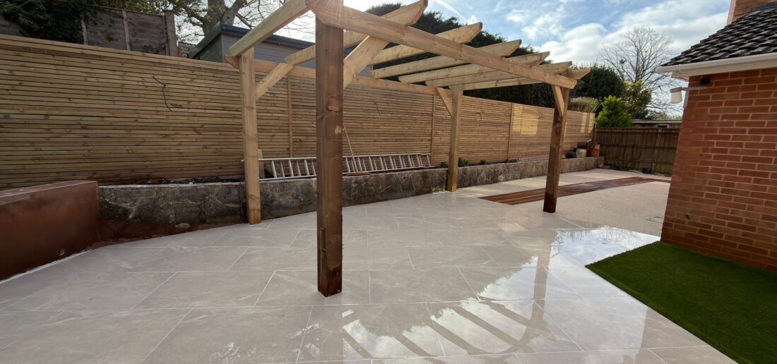pergola porcelain patio slatted fence exeter