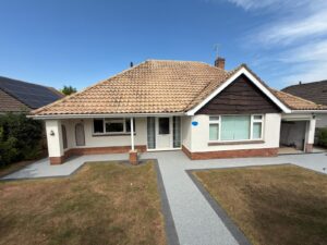 Permeable resin bound pathway across a front lawn in Devon